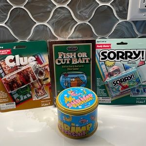 Clue, Sorry, Fish or Cut Bait and Shrimp Cocktail games. 2 are keychain. All new